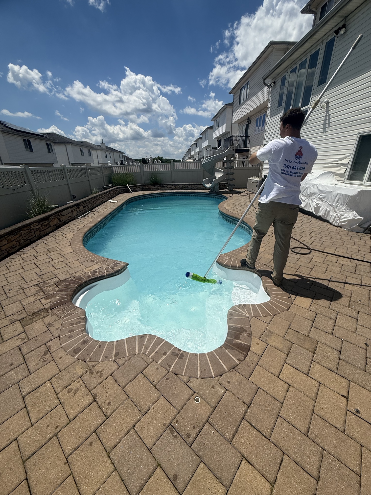 AW Property Services technician at work on a pool in Staten Island